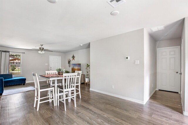 11260 Hodge Rd, Beaumont, TX 77713 - dining space featuring baseboards, wood finished floors, and a ceiling fan