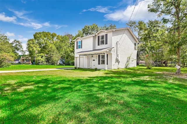 11260 Hodge Rd, Beaumont, TX 77713 - traditional home featuring a garage, a front yard, and driveway
