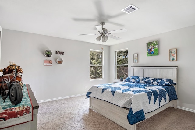 11260 Hodge Rd, Beaumont, TX 77713 - bedroom with carpet flooring, baseboards, and ceiling fan