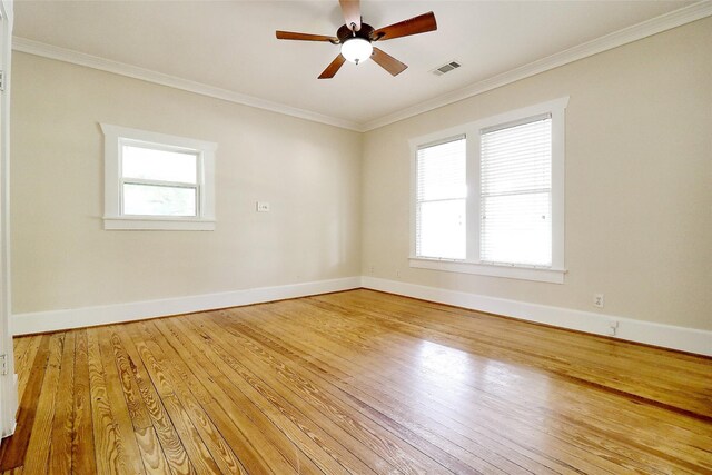 3704 5th St, Brookshire, TX 77423 - empty room with light wood-style flooring, crown molding, ceiling fan, and baseboards