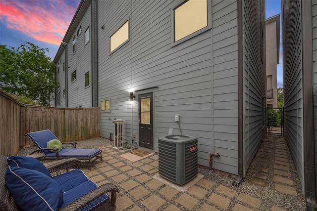 953 Saint Augustine St, Houston, TX 77023 - back of house with cooling unit, a patio, and a fenced backyard