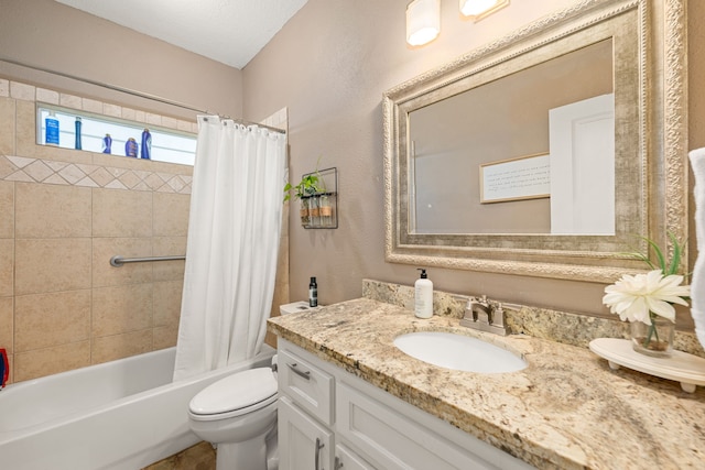 12596 Point Aquarius Blvd, Willis, TX 77318 - bathroom featuring toilet, vanity, shower / tub combo, and a textured wall