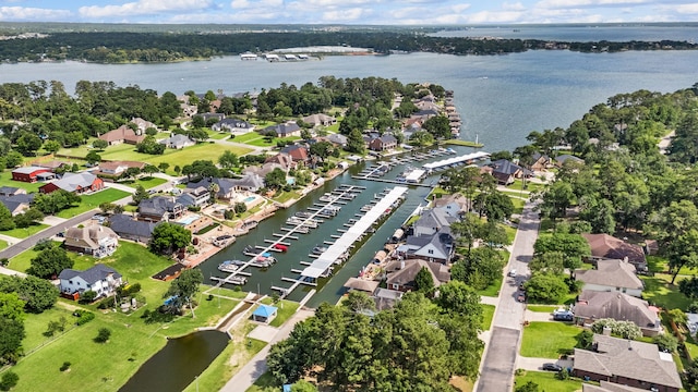 12596 Point Aquarius Blvd, Willis, TX 77318 - aerial overview of property's location featuring a nearby body of water and nearby suburban area