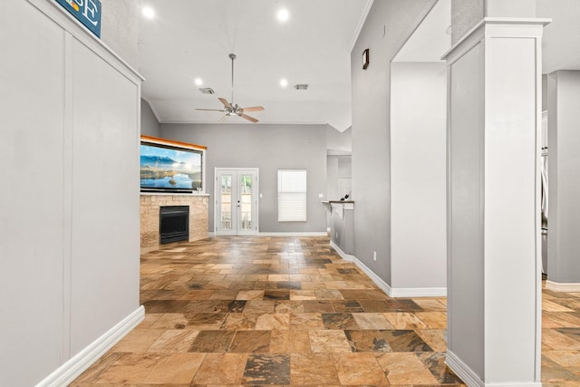 12596 Point Aquarius Blvd, Willis, TX 77318 - corridor featuring stone tile floors, recessed lighting, baseboards, and french doors