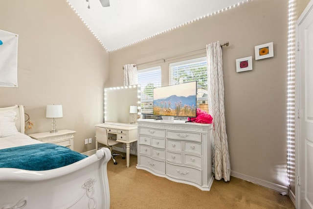 12596 Point Aquarius Blvd, Willis, TX 77318 - bedroom featuring light colored carpet, vaulted ceiling, and baseboards