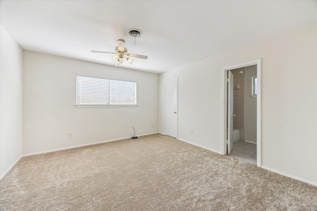9547 Beverlyhill St, Houston, TX 77063 - carpeted spare room with a ceiling fan and baseboards