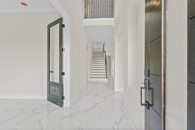 8102 Lanham Ln Unit A, Houston, TX 77075 - foyer entrance with marble tiled flooring, baseboards, and stairway