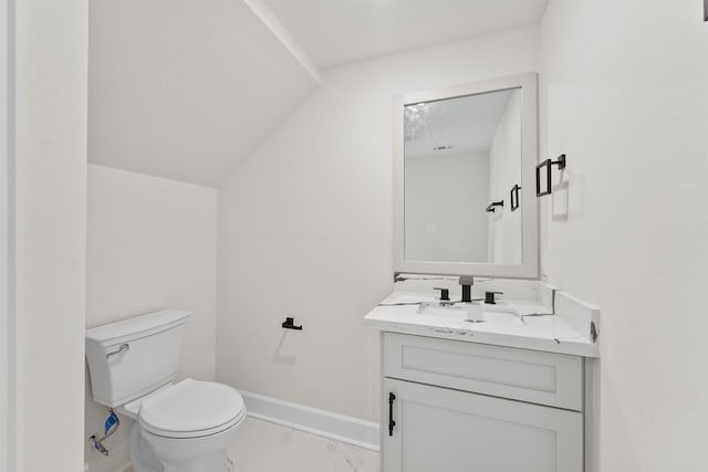 8102 Lanham Ln Unit A, Houston, TX 77075 - bathroom with marble look tiles, vanity, toilet, and baseboards