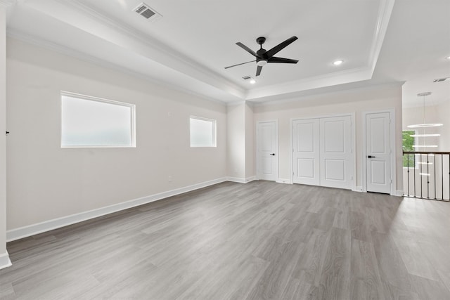 8102 Lanham Ln Unit A, Houston, TX 77075 - unfurnished bedroom featuring a raised ceiling, crown molding, light wood-style flooring, recessed lighting, and baseboards