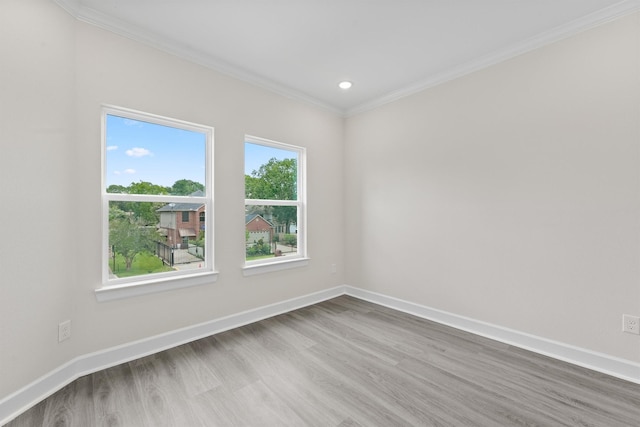 8102 Lanham Ln Unit A, Houston, TX 77075 - unfurnished room featuring wood finished floors, ornamental molding, baseboards, and recessed lighting