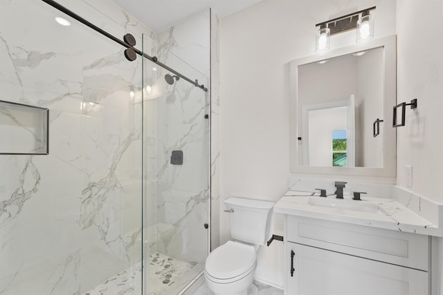 8102 Lanham Ln Unit A, Houston, TX 77075 - bathroom featuring toilet, a marble finish shower, and vanity