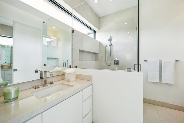 311 Brown Saddle St, Houston, TX 77057 - full bath featuring a walk in shower, vanity, and tile patterned floors