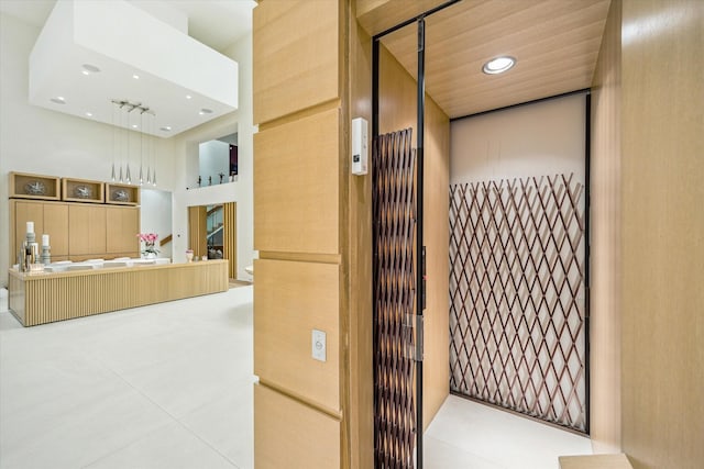 311 Brown Saddle St, Houston, TX 77057 - elevator featuring recessed lighting