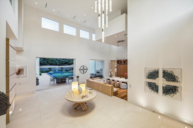 311 Brown Saddle St, Houston, TX 77057 - tiled living room featuring a towering ceiling