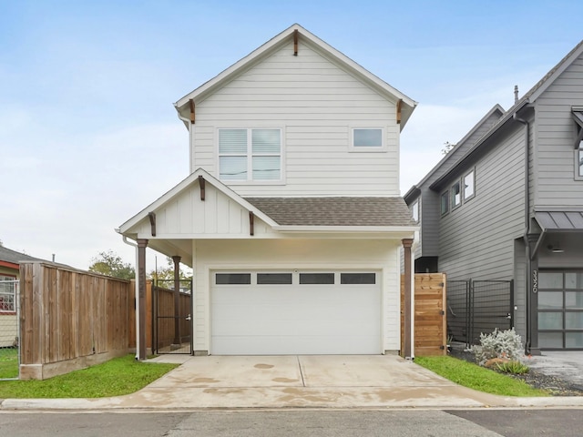 3322 Delhi St, Houston, TX 77022 - view of front of house featuring a gate, a shingled roof, an attached garage, concrete driveway, and fence