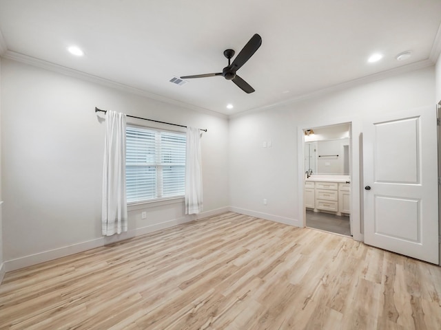 3322 Delhi St, Houston, TX 77022 - unfurnished bedroom featuring crown molding, light wood finished floors, ensuite bath, baseboards, and recessed lighting