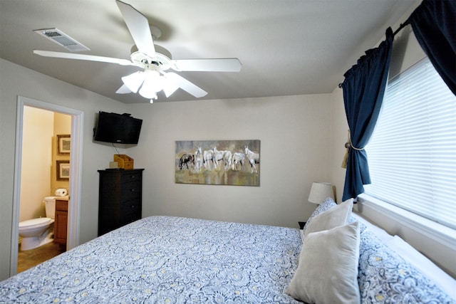 730 E Mather St Unit J-301, New Braunfels, TX 78130 - bedroom with ensuite bathroom and ceiling fan