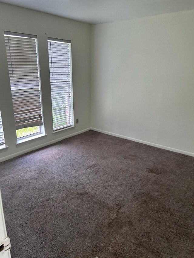 4315 Woodmont Dr, South Houston, TX 77045 - unfurnished room featuring carpet and baseboards