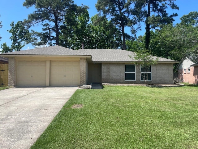 8315 Marble Arch Ct, Humble, TX 77338 - view of front of home featuring an attached garage, brick siding, driveway, a front yard, and a shingled roof