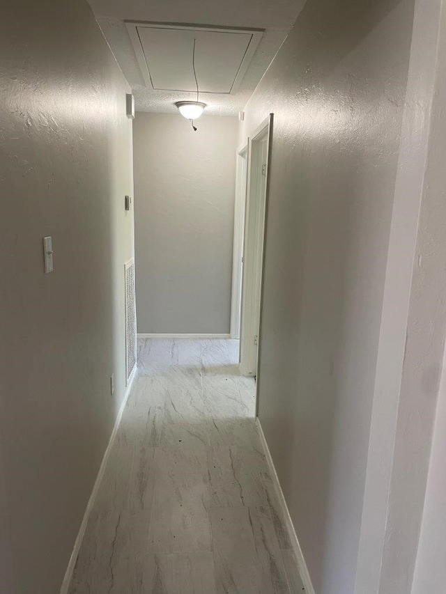 8315 Marble Arch Ct, Humble, TX 77338 - hall with attic access and baseboards