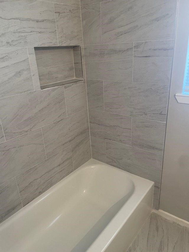 8315 Marble Arch Ct, Humble, TX 77338 - full bathroom featuring marble look tile flooring