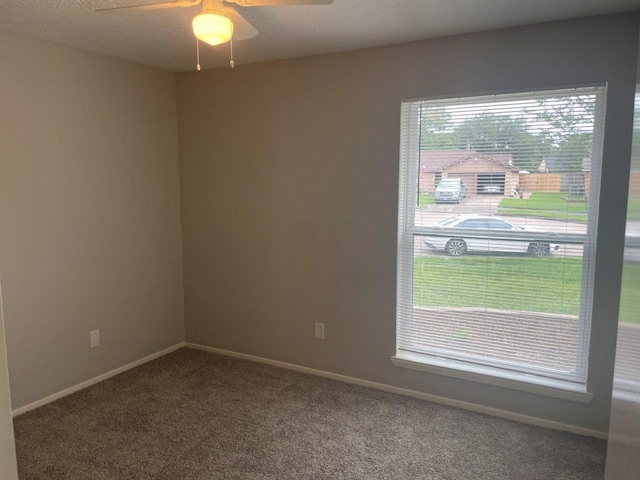 8315 Marble Arch Ct, Humble, TX 77338 - spare room with a ceiling fan, carpet floors, and baseboards