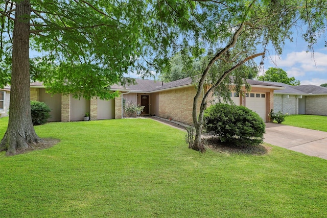 2622 Count Eric Dr, Houston, TX 77084 - single story home with an attached garage, driveway, a front lawn, brick siding, and roof with shingles