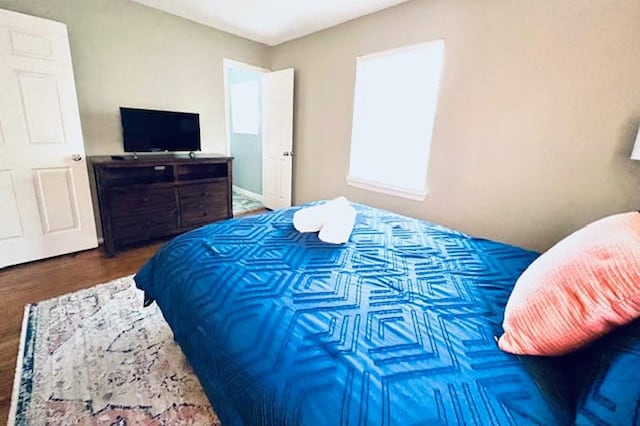 715 S Nugent St, La Porte, TX 77571 - bedroom featuring wood finished floors