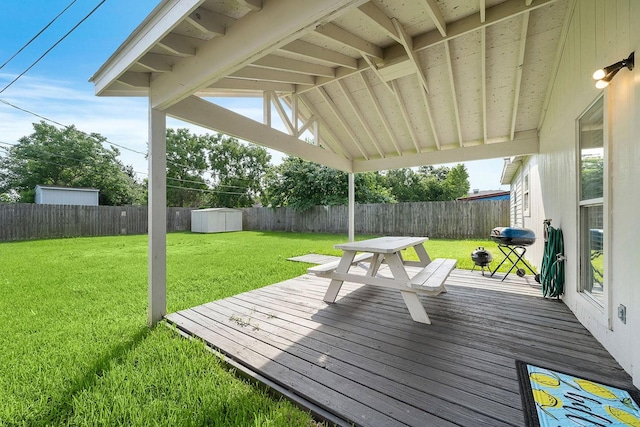 715 S Nugent St, La Porte, TX 77571 - deck with a storage unit and an outbuilding