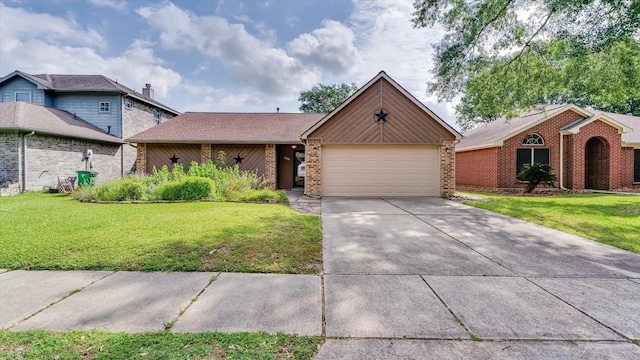 23938 Spring Way Dr, Spring, TX 77373 - view of front of property featuring an attached garage, driveway, a front yard, and brick siding