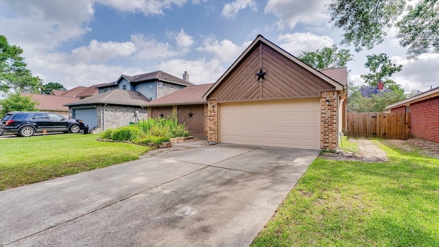 23938 Spring Way Dr, Spring, TX 77373 - view of front of home with brick siding, a garage, and driveway