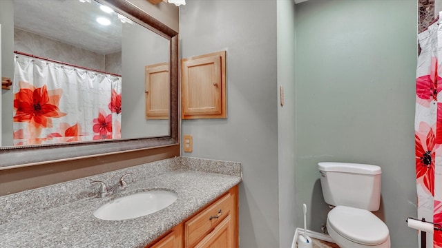 23938 Spring Way Dr, Spring, TX 77373 - bathroom with vanity, toilet, and curtained shower