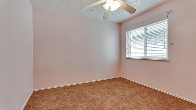 23938 Spring Way Dr, Spring, TX 77373 - unfurnished room with carpet floors, a ceiling fan, baseboards, and a textured ceiling