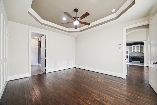 7930 Rippling Stream Ln, Richmond, TX 77407 - unfurnished room with a raised ceiling, ceiling fan, crown molding, hardwood / wood-style flooring, and baseboards