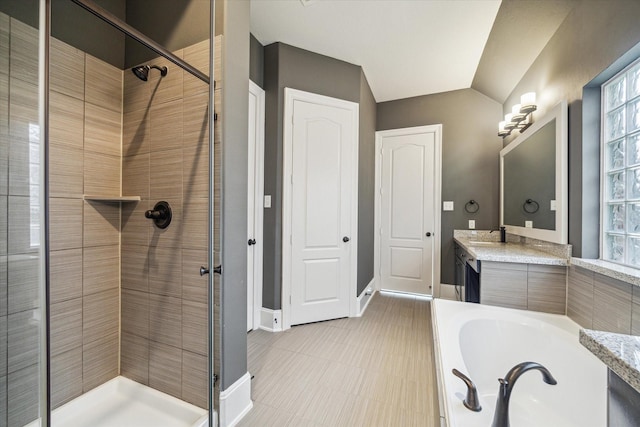 7930 Rippling Stream Ln, Richmond, TX 77407 - full bath featuring a shower stall, vanity, baseboards, and healthy amount of natural light