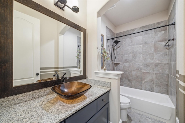 7930 Rippling Stream Ln, Richmond, TX 77407 - bathroom featuring toilet, shower / bathtub combination, and vanity