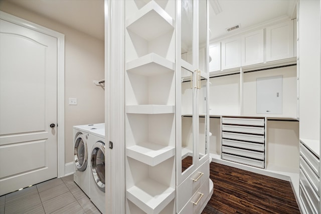 7930 Rippling Stream Ln, Richmond, TX 77407 - laundry room with independent washer and dryer and light tile patterned floors