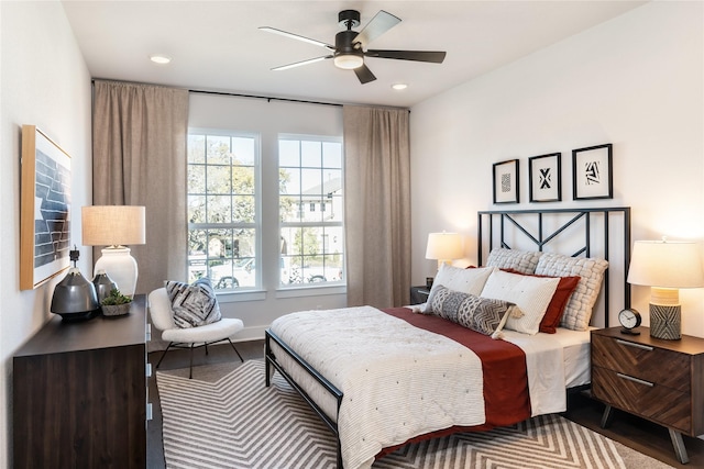 9122 Heckenberg Arbor Ln, Cypress, TX 77433 - bedroom featuring wood finished floors, recessed lighting, and a ceiling fan
