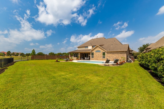 11702 Saporito Way, Richmond, TX 77406 - back of property featuring a patio and brick siding
