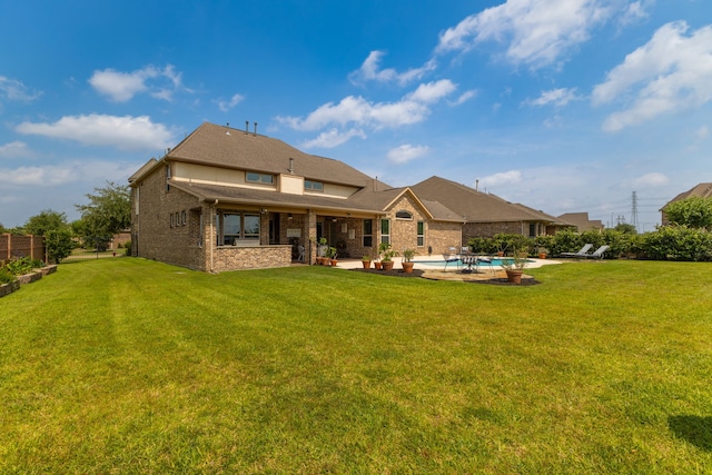 11702 Saporito Way, Richmond, TX 77406 - rear view of house with a patio area and brick siding