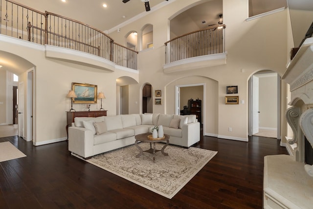 11702 Saporito Way, Richmond, TX 77406 - living area featuring a ceiling fan, arched walkways, baseboards, a towering ceiling, and recessed lighting