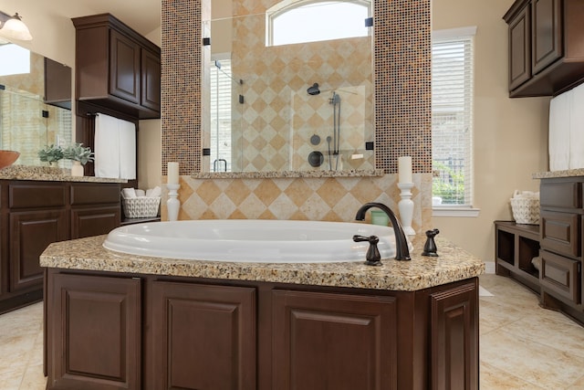 11702 Saporito Way, Richmond, TX 77406 - full bath with a stall shower, healthy amount of natural light, and a bath