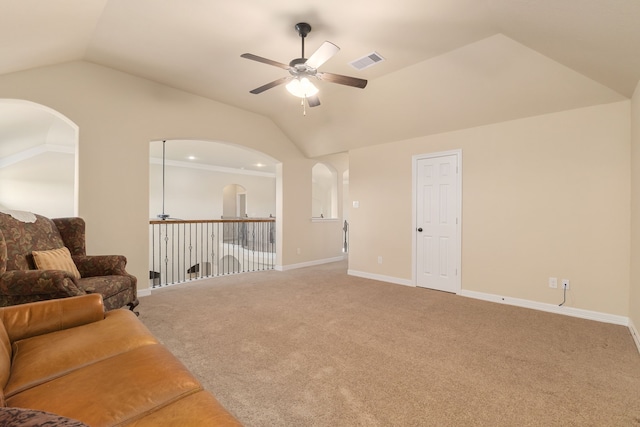 11702 Saporito Way, Richmond, TX 77406 - living area with ceiling fan, vaulted ceiling, light colored carpet, arched walkways, and baseboards