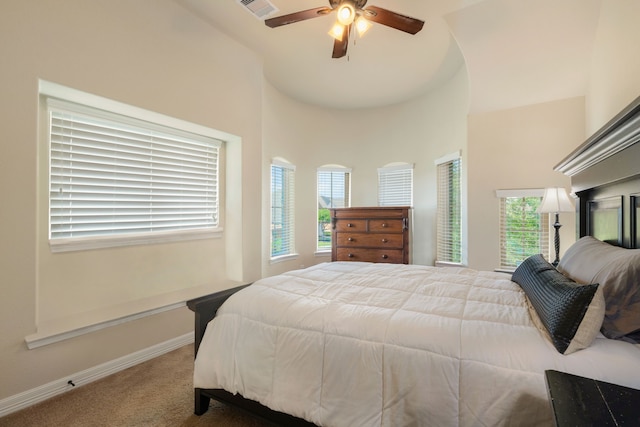 11702 Saporito Way, Richmond, TX 77406 - bedroom with carpet flooring, baseboards, a ceiling fan, and a high ceiling