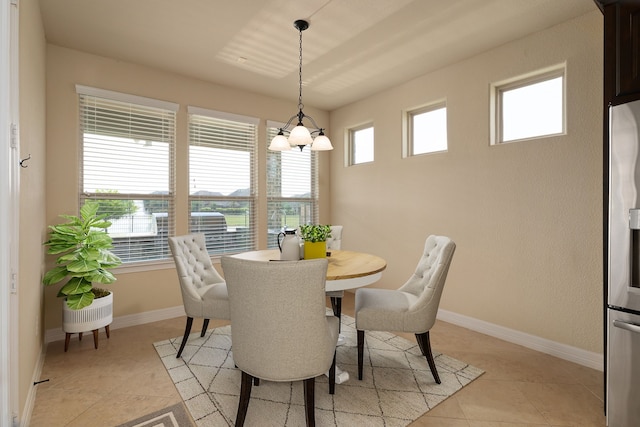 11702 Saporito Way, Richmond, TX 77406 - dining area with baseboards and light tile patterned flooring