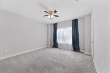 1804 Schweikhardt St, Houston, TX 77020 - carpeted empty room with a ceiling fan and baseboards