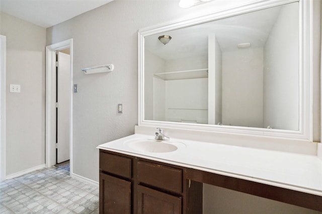 19826 Creston Cove Ct, Cypress, TX 77433 - bathroom featuring vanity, tile patterned floors, and baseboards