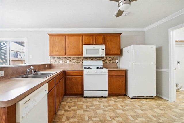 19826 Creston Cove Ct, Cypress, TX 77433 - kitchen with white appliances, a sink, ornamental molding, decorative backsplash, and brown cabinets