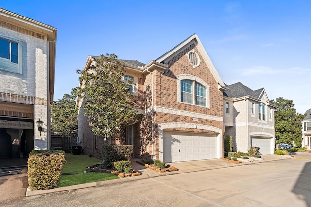 10106 Holly Chase Dr, Houston, TX 77042 - view of property featuring brick siding, concrete driveway, and a garage