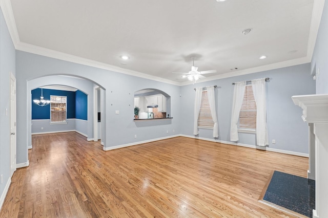 10106 Holly Chase Dr, Houston, TX 77042 - unfurnished living room with ceiling fan, crown molding, light wood finished floors, recessed lighting, and baseboards